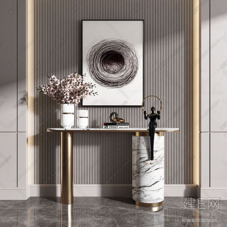 an elegant console table with vases and flowers on it in front of a striped wall