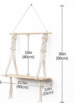 a white rope swing hanging from a wall with measurements for the size and width of it