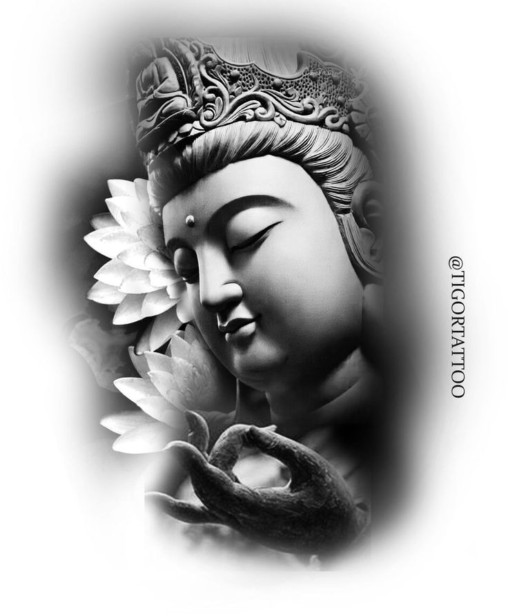 the buddha statue is holding a flower in its hand and it looks like he has his eyes closed