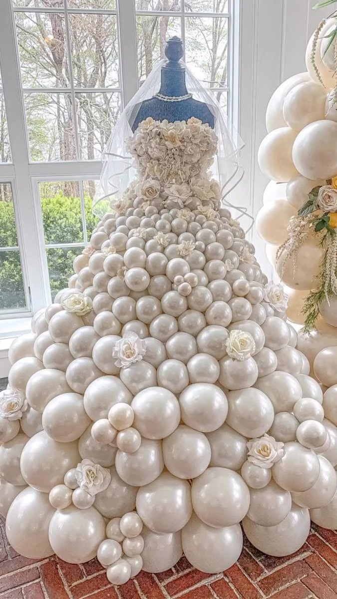 a wedding dress made out of balloons