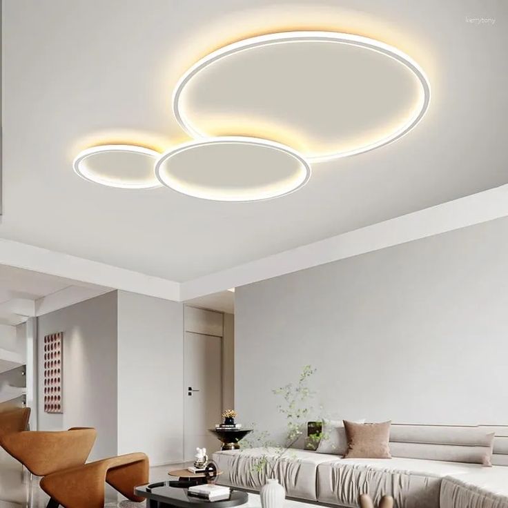 modern living room with white furniture and round lights