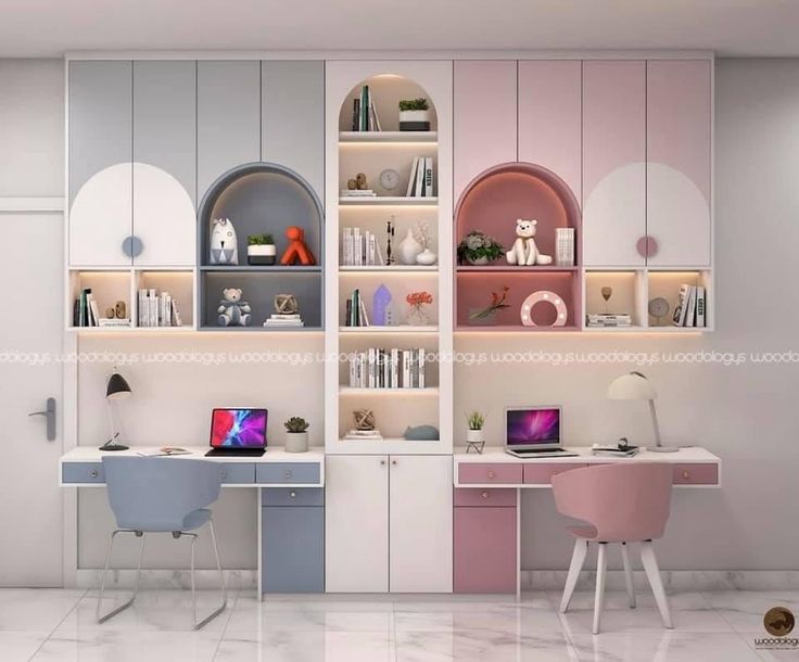 a computer desk sitting next to a laptop on top of a white table in a room