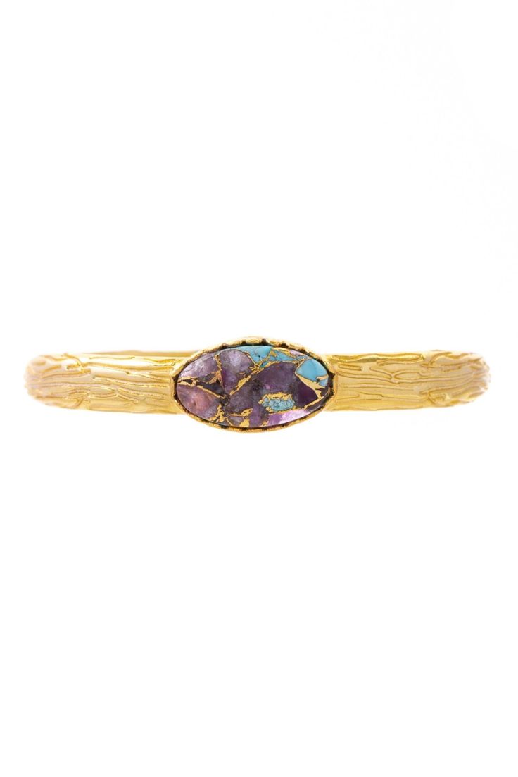 Add a touch of elegance to your outfit with our Gemstone Cuff Bracelet! This bracelet is made of 18k gold-plated brass and showcases a genuine gemstone in the center. We hand-select each stone for its unique beauty, and you can choose from various gemstones, such as turquoise and black onyx, to find the one that speaks to you. The adjustable design ensures a comfortable and secure fit for any wrist, making it a lovely gift for yourself or a loved one. This timeless bracelet is ideal for adding g Elegant Adjustable Gemstone Cuff Bracelet, Elegant Cuff Bracelet With Natural Stones, Elegant Natural Stones Cuff Bangle Bracelet, Elegant Natural Stone Cuff Bangle, Elegant Natural Stones Cuff Bracelet, Luxury Adjustable Open Cuff Jewelry, Adjustable Luxury Brass Bangle, Luxury Adjustable Brass Bangle, Adjustable Gemstone Bangle For Formal Occasions