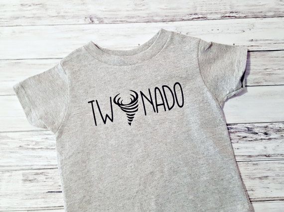 a baby t - shirt with the word iwdnado printed in black on it