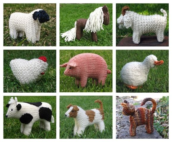 there are many knitted animals on the grass in different poses, including an animal and a dog