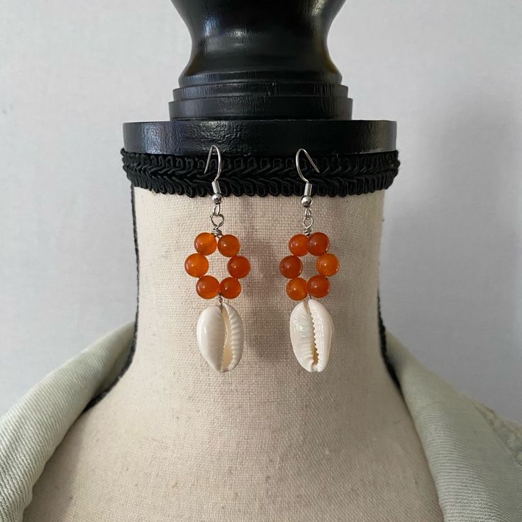 New Handmade Shell Earrings Orange Drop Earrings For The Beach, Orange Drop Earrings For Beach, Orange Round Earrings For Summer, Orange Dangle Jewelry For Beach, Handmade Orange Beaded Earrings For Summer, Orange Beaded Earrings For Summer Gift, Summer Orange Beaded Earrings As Gift, Nickel-free Orange Jewelry For Beach, Nickel-free Orange Jewelry For The Beach