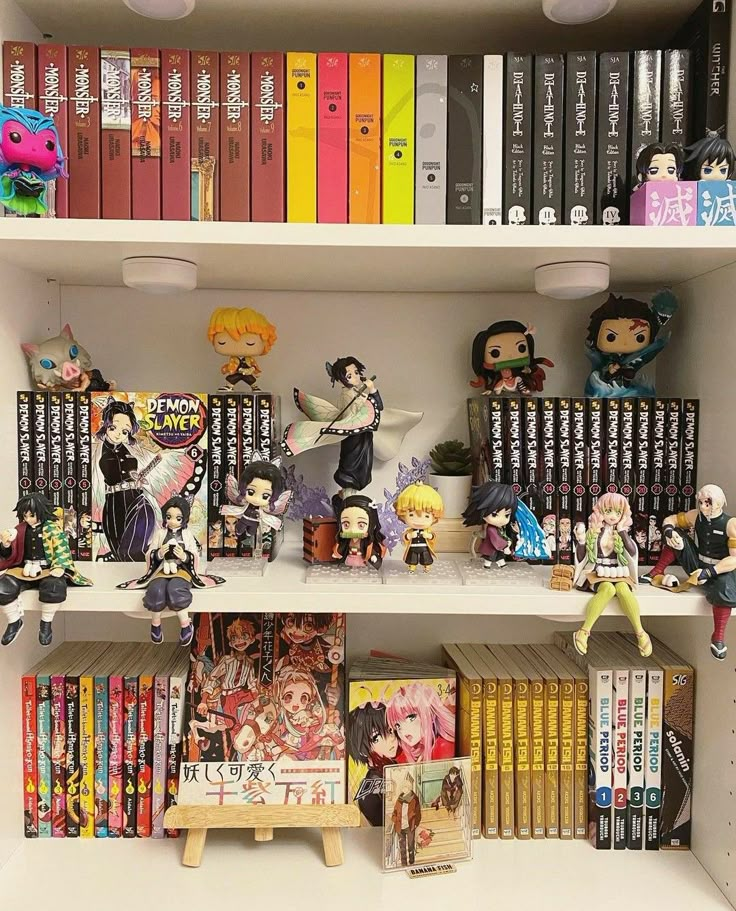 a shelf filled with anime figurines and books