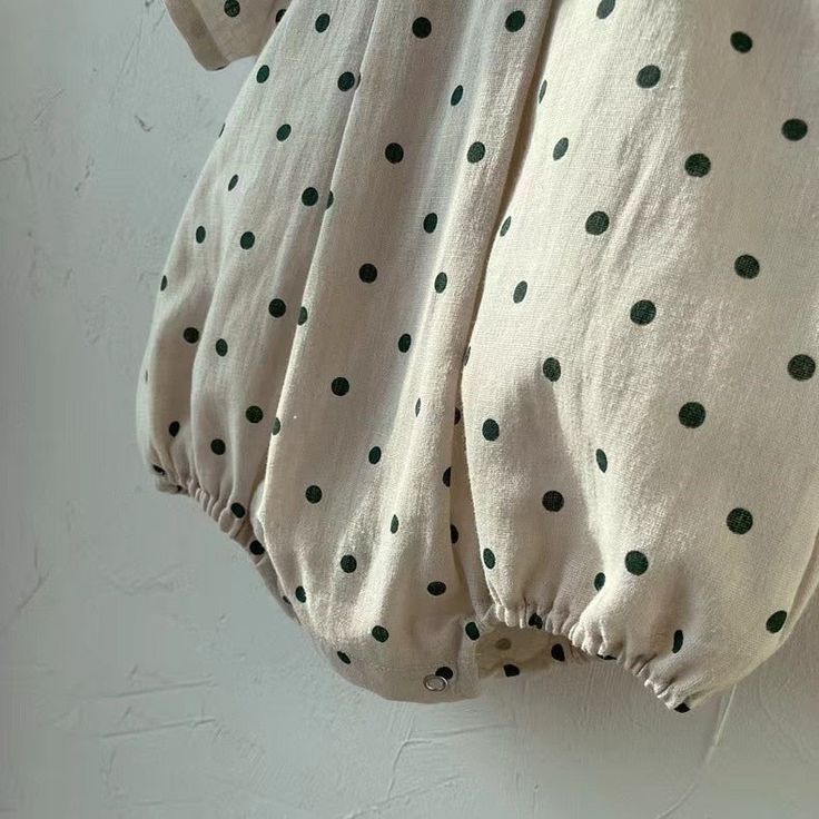 This adorable baby romper is perfect for summer days. It is made of soft, breathable cotton and features a short-sleeved, o-neck design. The romper is decorated with a sweet polka dot pattern or striped pattern that is sure to turn heads. It is available in a variety of sizes to fit babies of all ages. The romper is easy to put on and take off, making it a breeze to dress your baby. It is also machine-washable, so you can keep it clean and fresh. This romper is the perfect addition to your baby' Cotton Short Sleeve Bubble Romper For Spring, Cotton Bubble Romper With Short Sleeves For Spring, Playful Short Sleeve Onesie For Spring, Spring Cotton Bubble Romper With Short Sleeves, Casual Short Sleeve Bodysuit For Spring Playtime, Cute Short Sleeve Jumpsuits And Rompers For Playtime, Short Sleeve Cotton Onesie For Spring, Spring Cotton Onesie With Short Sleeve, Beige Cotton Onesie For Spring