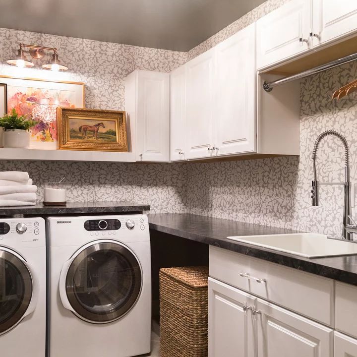 a washer and dryer in a small room