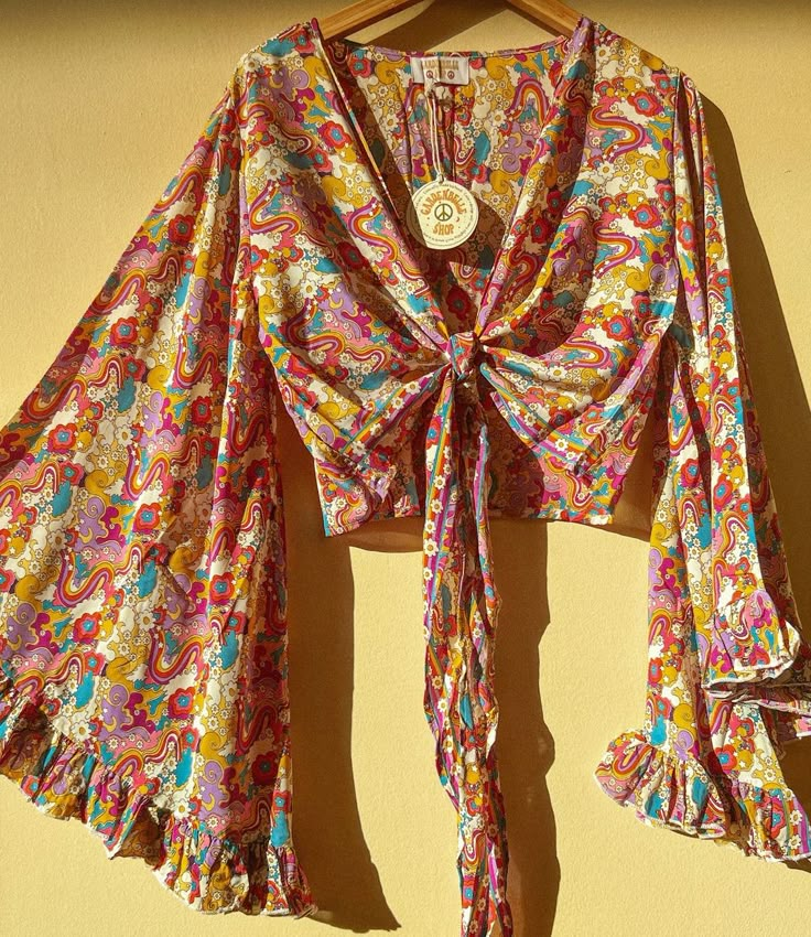 Psychedelic 3-way Bell Sleeve Tie Front Hippie Wrap Top 70s - Etsy Flowy Long Sleeve Tops With A Free-spirited Style, Bohemian Long Sleeve Blouse As Beach Cover-up, Bohemian Long Sleeve Blouse For Beach Cover-up, Bohemian Rayon Blouse For Spring, Rayon Tops For Fall Festival, Spring Long Sleeve Blouse For Beach, Spring Long Sleeve Beach Cover-up Blouse, Long Sleeve Boho Top For Vacation, Free-spirited Long Sleeve Festival Blouse