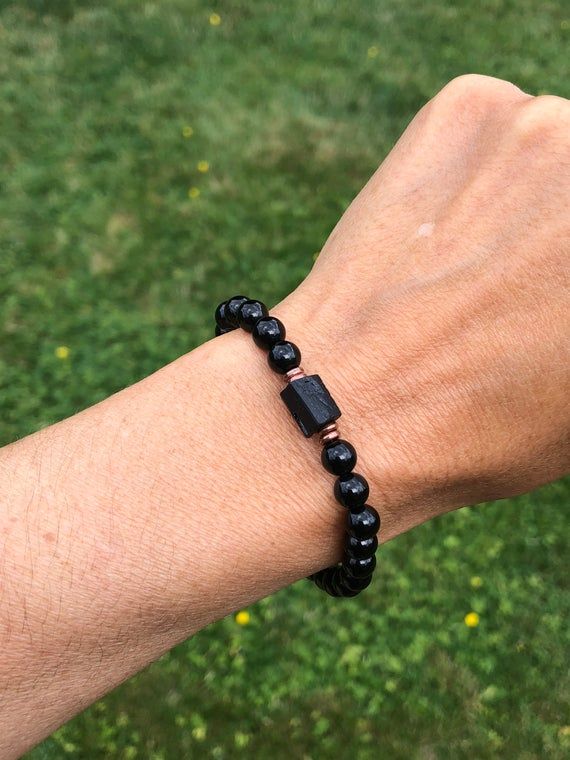 One of my best selling bracelets now available in 6mm stones. All the benefits of black tourmaline with a constant reminder of the absolute beauty in raw, unpolished and “imperfect”. (Insert favourite metaphor here: for humanity, life, love, authenticity, etc😊)This simple yet powerful 6mm AAA Black Tourmaline bracelet features a rugged raw black tourmaline nugget focal stone! One of the best healing stones for protection and overall wellbeing!!Materials:6mm AAA Grade Black Tourmaline 7-8mm Genu Minimalist Black Beaded Bracelet With Natural Stones, Minimalist Black Beaded Bracelets With Natural Stones, Black Bracelets With Natural Stones For Everyday, Minimalist Black Bracelet For Meditation, Minimalist Black Bracelets For Meditation, Spiritual Hypoallergenic Black Bracelets, Spiritual Black Hypoallergenic Bracelets, Hypoallergenic Black Spiritual Bracelets, Hypoallergenic Black Bracelets For Meditation