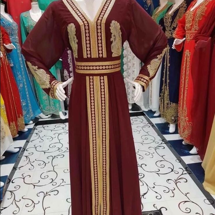 Maxi Dress With Beautiful Chiffon Material And Gold Embroidered Elegant Red Kaftan With Floral Embroidery, Traditional Red Chiffon Dress, Red Long Chiffon Dress, Elegant Red Embroidered Maxi Dress, Elegant Red Embroidered Long Sleeve Dress, Elegant Red Long Sleeve Embroidered Dress, Elegant Long Sleeve Red Embroidered Dress, Red Georgette Dress With Floral Embroidery, Embroidered Chiffon Floor-length Dress