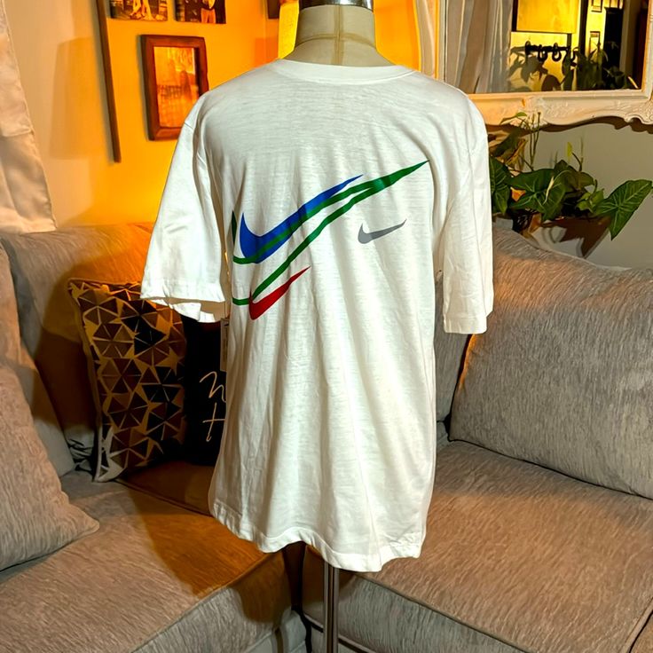 Xl Nike Standard Fit Tee With Blue Green Red Nike Graphics Nike Relaxed Fit Shirt For Spring, Nike Summer Shirt Relaxed Fit, Nike Casual Crew Neck Shirt, Nike Casual Short Sleeve Shirt, Vintage Nike Cotton Tops, Casual Nike Crew Neck Shirt, Multicolor Nike Crew Neck T-shirt, Nike Retro Short Sleeve Top, Retro Nike Tops With Graphic Print