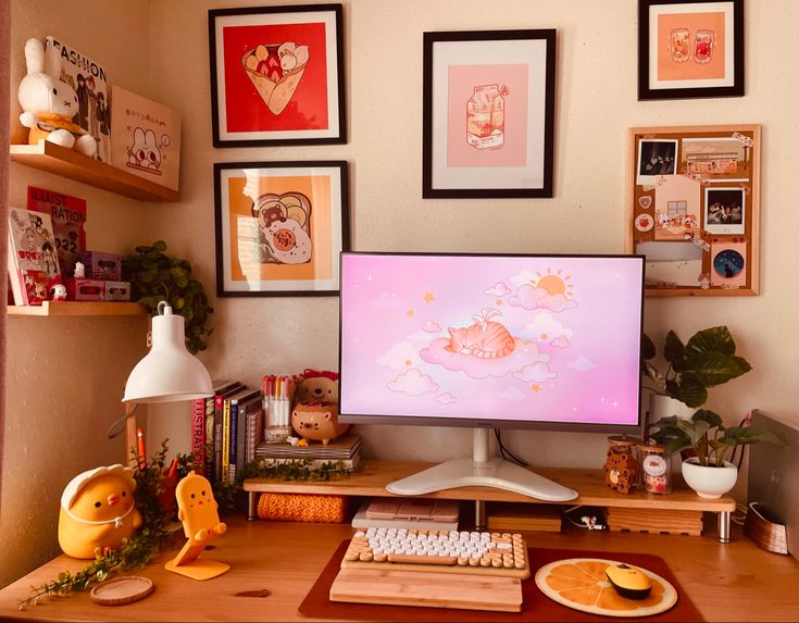 a computer monitor sitting on top of a wooden desk next to a keyboard and mouse