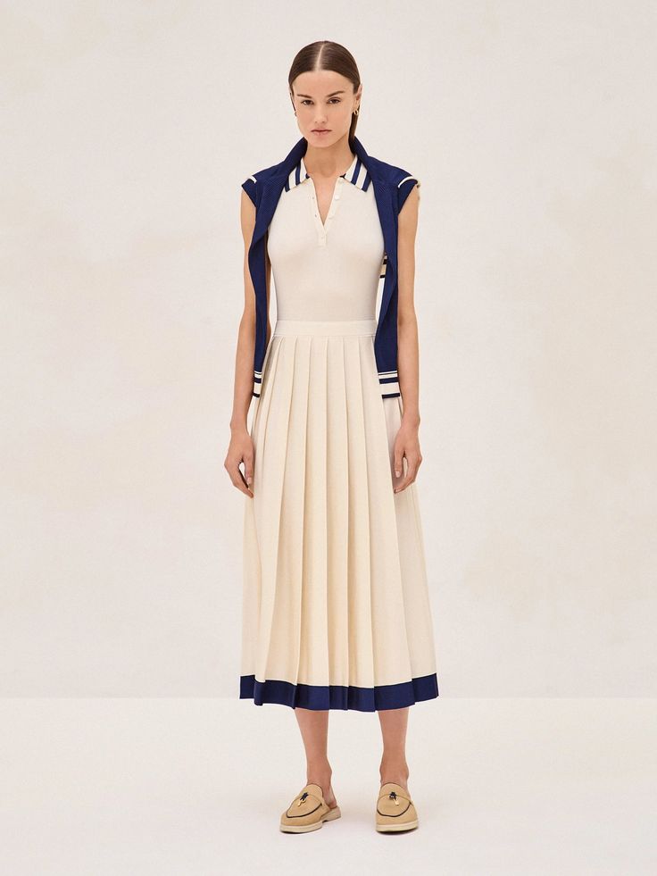 The Ciele Midi Dress is a perfect blend of elegance and comfort. Its collar and button detail give a subtle nod to classic style, while the ivory flows into a pleated midi skirt trimmed with a broad, marine blue hem that adds just the right amount of contrast. It's a versatile piece that works for both office settings and weekend brunches. Pair it with sandals for a relaxed yet sophisticated look. Linen Maxi Dress, Dress Home, Marine Blue, Strapless Mini Dress, Pleated Midi Skirt, Pink Mini Dresses, White Midi Dress, Collar Dress, Button Detail