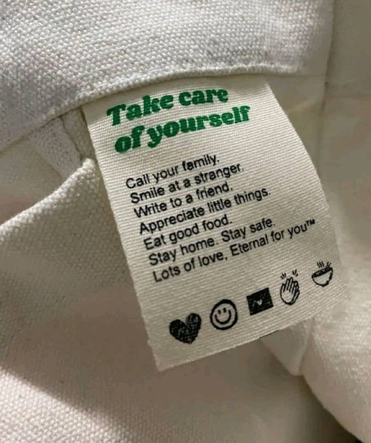 a label on a white shirt that says take care of yourself