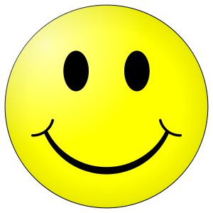 a yellow smiley face with two eyes and one eye closed, in front of a black background