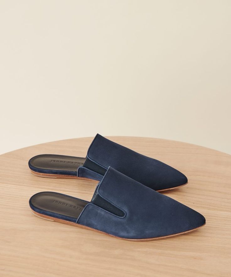 Oiled Leather Mule Navy The classic, wear-anywhere mule is a wardrobe workhorse. With a sleek pointed toe that elongates the leg, this chic and comfortable flat pulls together any outfit. Made in Italy. Oiled leather with lightly padded leather insole, elastic gussets at sides and pointed toe. | Jenni Kayne Oiled Leather Mule Size 35 Jenni Kayne, Comfortable Flats, Leather Mules, Mule Flat, Vintage Jeans, Get Dressed, Mule, Mule Shoe, In Italy