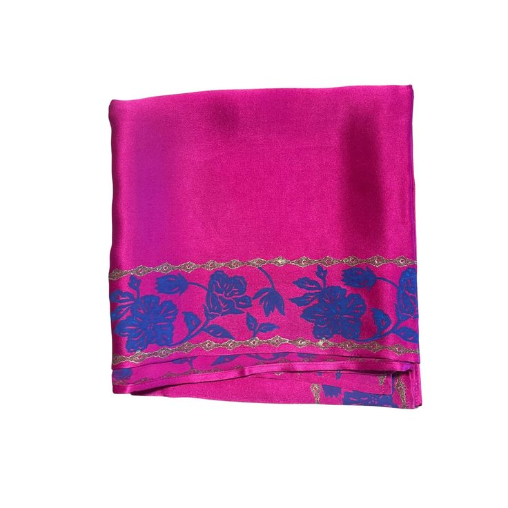 Maharani pink organic peace silk scarf with hand block printed floral motifs on the borders. The motifs have lotus and hibiscus flowers with little stylized leaves.  The base fabric is from a Gots certified peace silk manufacturer, who ensures that the silkworms hatch out of their cocoons as butterflies and complete their natural life cycle.  You can style it to complement various outfits. Wear it as a Bandeau top, or wrap it around your neck as a choker to look fresh and modern throughout the s Festive Pink Block Print Dupatta, Pink Unstitched Embroidered Saree, Pink Unstitched Saree With Embroidered Border, Pink Embroidered Border Unstitched Saree, Unstitched Pink Saree With Embroidered Border, Pink Dupatta With Block Print In Traditional Drape, Pink Floral Print Silk Scarves, Pink Silk Scarf With Floral Print, Traditional Pink Saree With Block Print