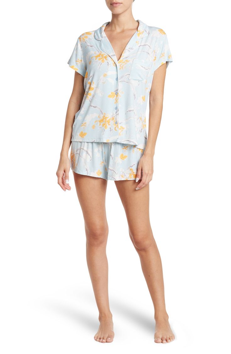 Get that chic put-together feel even in your jammies with this lightweight printed set. Top: 25" length (size S); Bottom: 10.5" rise, 3" inseam Top has notch lapel, short sleeves, and front patch pocket Bottom has elasticized waist and allover print 95% rayon, 5% spandex Machine wash Imported Model stats: 5'10", Bust: 32", Waist: 25", Hip: 36". Model is wearing size S. Spring Sleepwear Sets With Short Sleeves, Casual Relaxed Fit Bedtime Set, Comfortable Short Sleeve Summer Sets, Comfortable Summer Sets With Short Sleeve, Comfortable Short Sleeve Sets For Summer, Spring Short Sleeve Sleepwear For Pajama Party, Comfortable Relaxed Fit Short Sleeve Sets, Casual Short Sleeve Sleep Set, Relaxed Fit Short Sleeve Sets