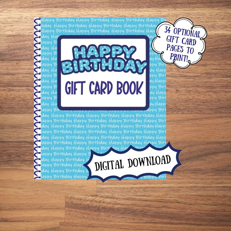 a happy birthday gift card book sitting on top of a wooden table