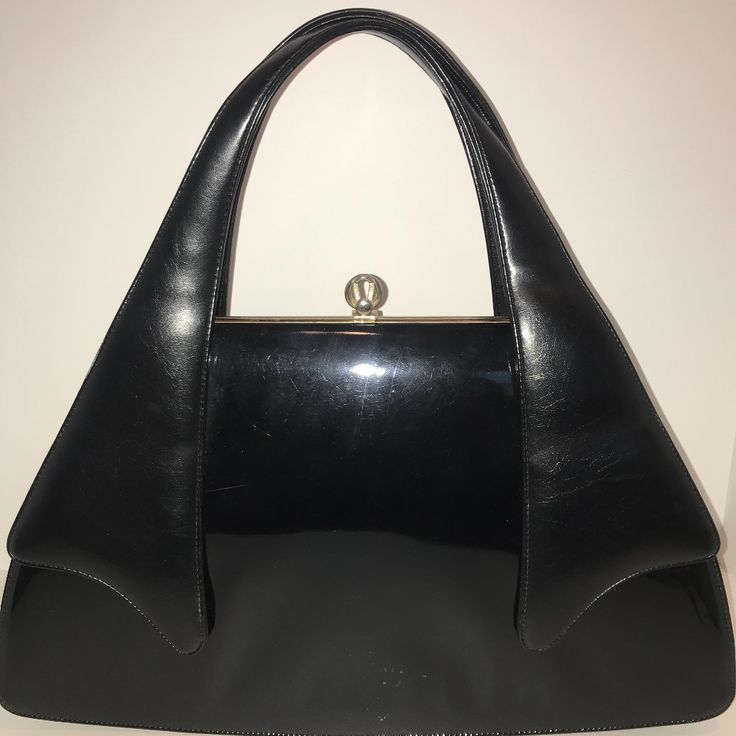 Large Vintage Patent Leather Formal Handbag, Black With Cream Leather Inner Lining. Price Is Based On Being A Rare Vintage Handbag Designer Piece. This Designer’s Items Have Been Described As Being Leather, There Is No Indication Attached To Item Either Way. Have Enclosed A Listing Of A Similar Item By Same Designer. Designer Satchel Bags For Evening, Retro Leather Evening Bags, Vintage Leather Bag For Evening, Classic Leather Party Bag, Classic Leather Satchel For Party, Classic Leather Party Bags, Retro Evening Satchel With Detachable Handle, Retro Leather Satchel For Evening, Classic Box Bag With Handles For Evening