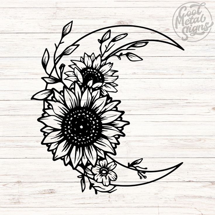 a sunflower and crescent moon on a wooden background