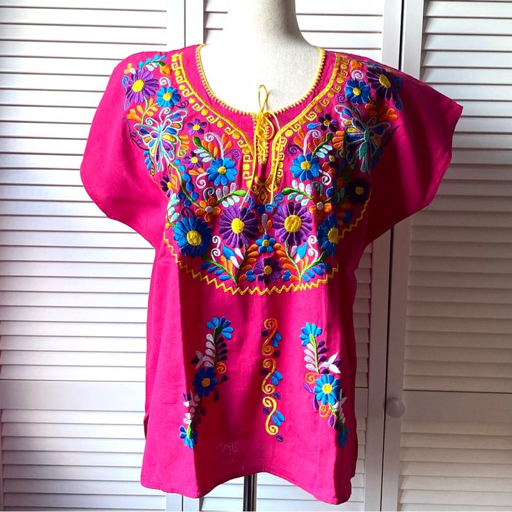 Embroidered Mexican Hot-Pink Blouse New Without Tags Size L Please See Photos And Video For Best Description And Measurements Pink Embroidered Beach Top, Beach Embroidered Pink Tops, Pink Blouse With Embroidered Neckline For Spring, Pink Short Sleeve Embroidered Cotton Top, Pink Bohemian Embroidered Top With Floral Design, Pink Bohemian Tops With Crew Neck, Spring Embroidered Pink Blouse, Pink Short Sleeve Embroidered Top For Spring, Pink Bohemian Crew Neck Top