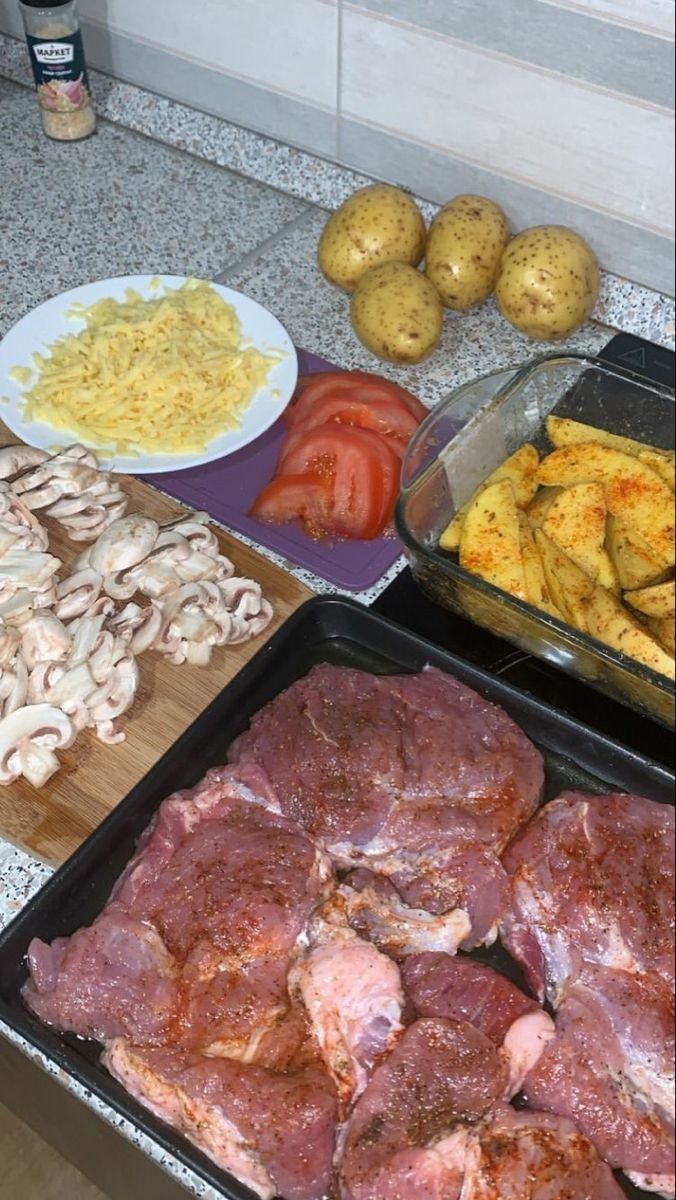 the food is prepared and ready to be cooked in the oven for us to eat