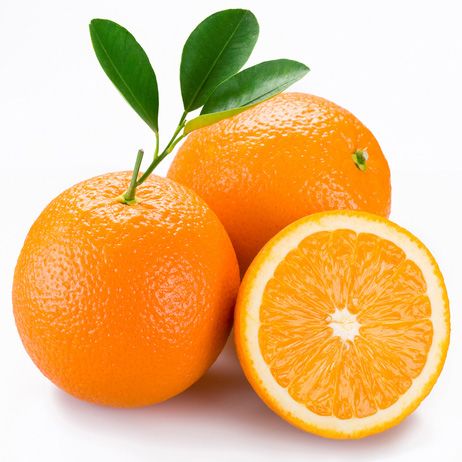 three oranges with leaves on white background