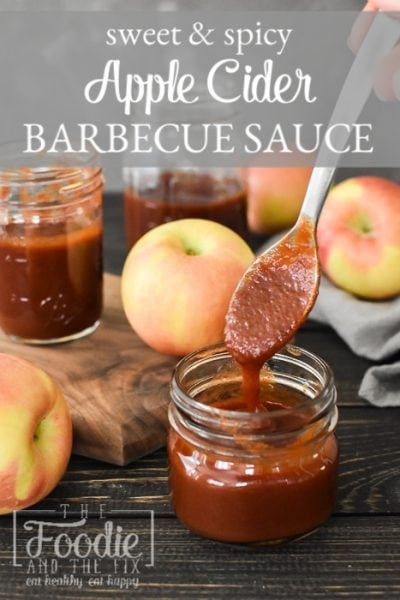 an apple cider barbecue sauce is being poured into a jar