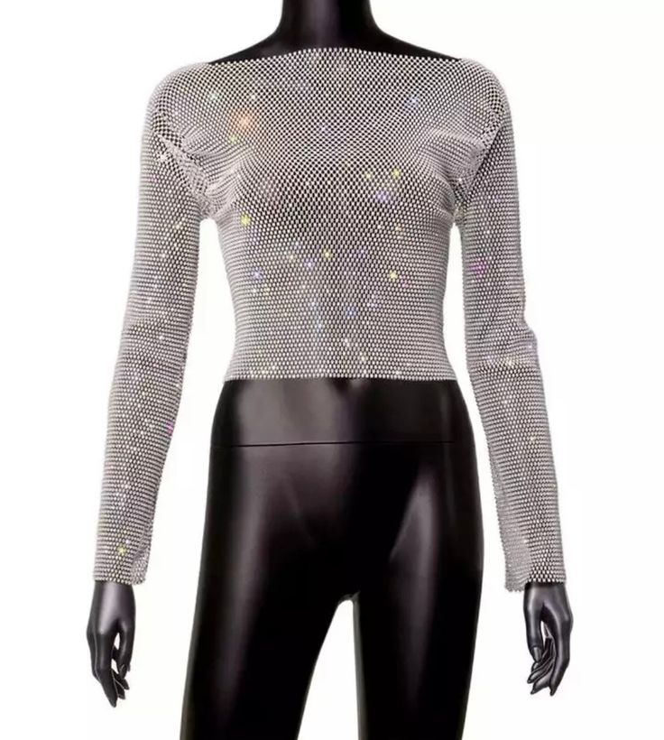 Rhinestone mesh long sleeve top.The fabric of this top is very stretchy. One size top (goes between XS, S, M, L, XL) Long Sleeve Stretch Tops For Club, Stretch Long Sleeve Club Tops, Trendy Evening Crop Top With Long Sleeves, Stretch Long Sleeve Tops For Club, Trendy Long Sleeve Evening Crop Top, Trendy Long Sleeve Crop Top For Evening, Trendy Club Tops With Mesh Sleeves, Trendy Tops With Mesh Sleeves For Club, Evening Mesh Top With Long Sleeves