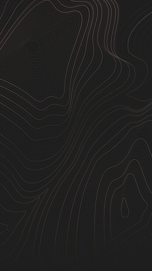 an abstract black and brown background with wavy lines