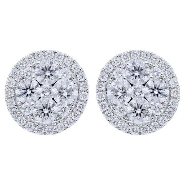 Diamond Total Carat Weight: Immerse yourself in the allure of the Moonlight Round Cluster Earring Studs, featuring an impressive total of 1.75 carats of diamonds. This pair is adorned with a meticulously arranged cluster of 70 round diamonds, each set in radiant 14K yellow gold. Diamonds: Experience the brilliance of 70 thoughtfully selected round diamonds, arranged in an enchanting cluster design. The arrangement maximizes the individual sparkle of each diamond, creating a stunning display that adds a touch of glamour to any occasion. Gold Setting: Expertly crafted in 14K yellow gold, the setting provides a warm and radiant background for the diamonds. The yellow gold setting complements the diamonds' natural beauty, creating a timeless and versatile accessory that seamlessly transitions Luxury Round Cluster Earrings With Prong Setting, Cluster Earrings Studs, Cluster Earring, Cluster Design, Earring Stud, Yellow Gold Setting, Earring Studs, Cluster Earrings, Belleza Natural