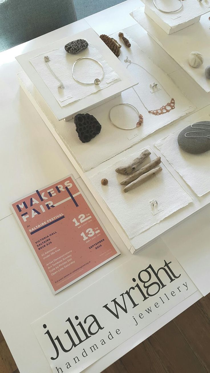 the table is covered with jewelry on display