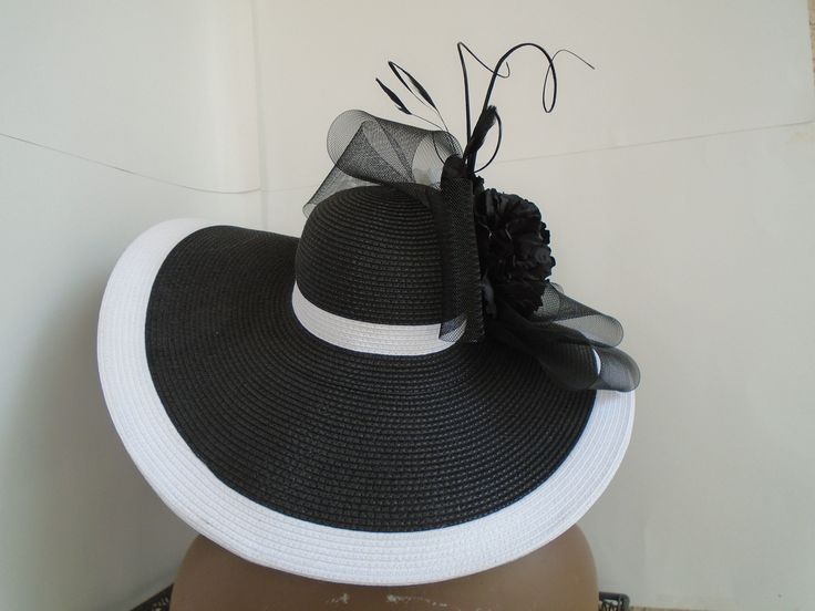 Summer Black Hats With Feather Trim, Black Summer Hat With Feather Trim, Black Summer Hats With Feather Trim, Black High Crown Top Hat For Spring, Spring Black Top Hat With High Crown, Black High Crown Top Hat, Chic White Fitted Costume Hats And Headpieces, Black High Crown Hat For Summer, Formal Mini Hats With Feather Trim For Spring