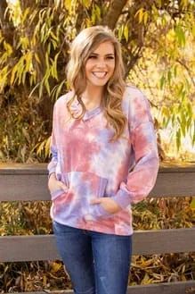 Lavender Tie Dye V-Neck Sweater - MOB Fashion Boutique Comfortable Top With Kangaroo Pocket For Fall, Pink Long Sleeve Top With Kangaroo Pocket, Pink Casual Tops With Side Pockets, Comfy Tops With Kangaroo Pocket For Loungewear, Casual Pink Tops With Side Pockets, Pink Crew Neck Top With Kangaroo Pocket, Casual V-neck Tops With Side Pockets, Spring Pink Tops With Side Pockets, Casual Purple Tops With Pockets