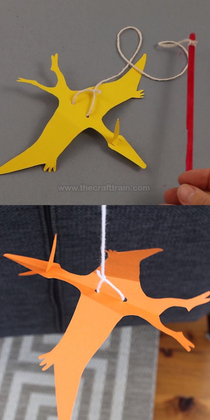 an image of some paper birds hanging from strings on the wall and another photo of one bird that has been cut out