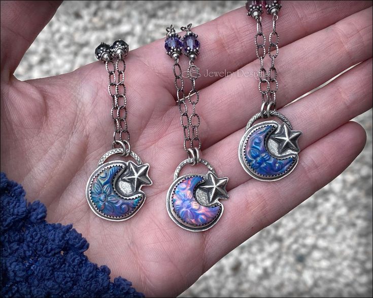 Aurora Opal Moon & Star Necklaces - Mini Collection | LE Jewelry Designs Mystical Iridescent Sterling Silver Jewelry, Celestial Silver Opal Necklace, Handmade Celestial Iridescent Necklace, Celestial Iridescent Pendant Jewelry, Magical Crescent Sterling Silver Jewelry, Handmade Iridescent Celestial Necklace, Celestial Opal Pendant Jewelry, Sterling Silver Celestial Charms Necklace, Sterling Silver Crescent Necklace With Charms