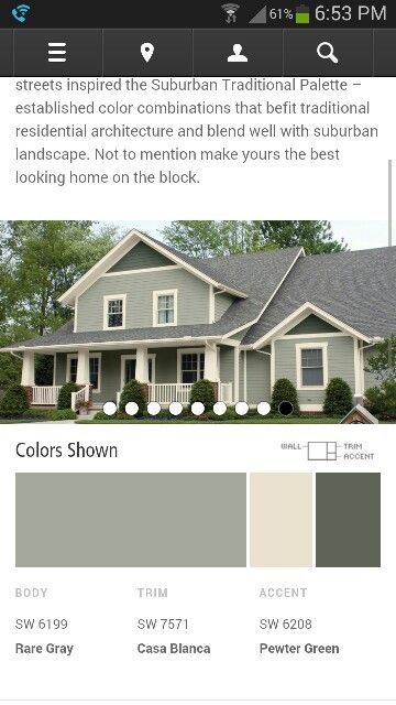 a house with gray paint and white trim