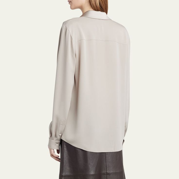 Giorgio Armani silk georgette blouse features a wrap front styling  V-neckline; spread collar  Long sleeves Back yoke  Mid-length  Relaxed fit  Silk Dry clean Made in Italy Semi-formal Silk V-neck Top, Formal Silk Top With Collared Neckline, Silk Collared Top For Office, Elegant Silk V-neck Blouse, Elegant Daywear Blouse With Collared Neckline, Chic Silk Blouse With Collared Neckline, Chic Evening Blouse With Spread Collar, Chic Blouse With Johnny Collar For Work, Silk Blouse With Collared Neckline For Office