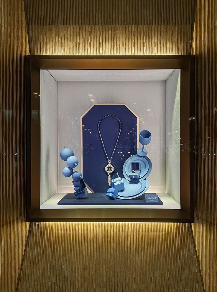 a display case with blue items in it