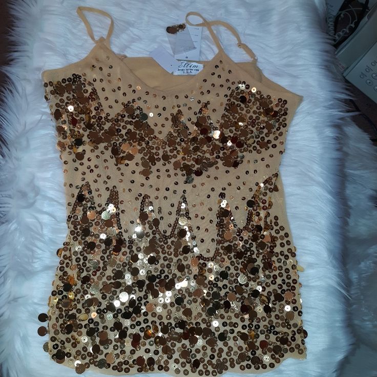 Gold Sequin Tank Top, Small Flat On Back, Lining. Small Flaw Onthe Back.. See Photos.. Still Wearable.. Can Be Worn With Or Without Jacket Sleeveless T-shirt For Night Out, Fitted Gold Tank Top, Trendy Gold Stretch Tops, Gold Stretch Tops For Summer, Gold Tank Top For Party, Stretch Gold Tops For Summer, Casual Gold Tank Top For Party, Gold Sequin Tops For Spring, Trendy Gold Summer Tops