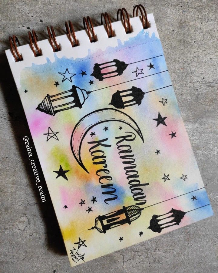 a spiral notebook with the words congratulations written in cursive writing and stars on it