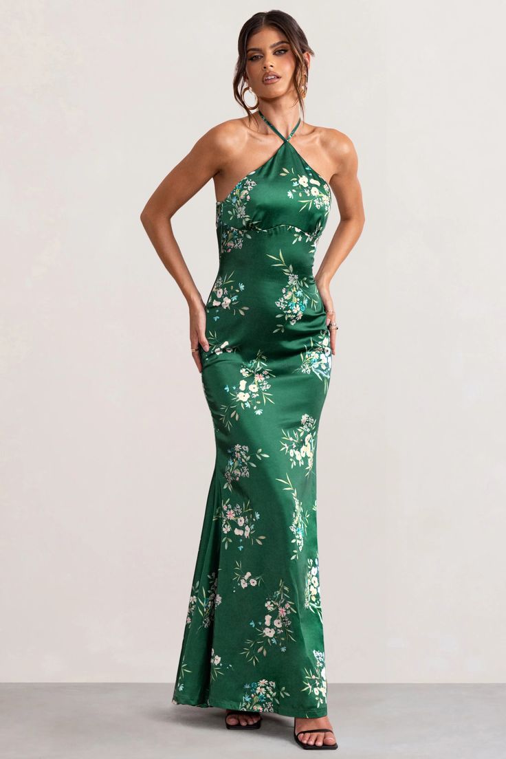 Look and feel utterly divine in our green floral print Grandeur halter neck maxi dress. Constructed in luxurious satin and with a cascading hemline, this stunning floor-sweeping gown is worthy of the red carpet. It's cut in a way that contours your curves beautifully – it cinches in at the waist and falls into an elegant fishtail shape, creating a gorgeous hourglass silhouette. This showstopping evening gown is essential for those special occasions. Red-carpet worthy!    Features  - Halter neckline  - Open back detail  - Floral print  - Premium satin fabric     Sizing & Fit   Model is 5’9 and wears UK size 8 / US size 4      Product Information      Slight stretch   Satin fabric (95% Polyester 5% Elastane)   Length from top of shoulder to hem: 157cm   SKU: CL126538 Green Halter Neck Dress For Formal Occasions, Green Maxi Length Halter Dress For Evening, Green Satin Halter Neck Dress, Green Halter Maxi Dress For Evening, Green Halter Neck Maxi Dress For Prom, Green Maxi Halter Dress For Evening, Green Floral Print Prom Dress, Elegant Green Halter Neck Maxi Dress, Green Floor-length Satin Evening Dress