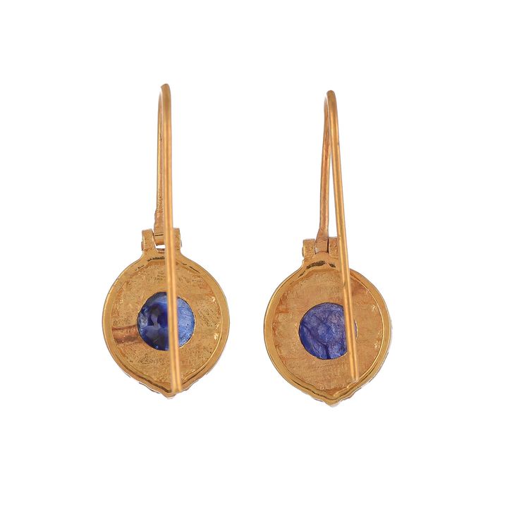 Blue Sapphire Vermeil 14K Gold Over Sterling Silver Earring 925 Silver = 4.65 gm. Blue Sapphire = 2.80 ct. Blue Sapphire is the birthstone for September and is a symbol of heaven. The beautiful earring measures to be 1.00 inches long including the wire and 0.50 inches wide at its maximum points. The earrings have been made by a team of highly trained and skilled artisans. What is Vermeil 14K Gold? It is a thick layer of 14K Gold plating on 925 Sterling Silver. If for any reason you are not compl Round Tanzanite Earrings For Anniversary, Tanzanite Earrings For Anniversary, Blue Tanzanite Round Earrings, Yellow Gold Tanzanite Jewelry With Matching Earrings, Tanzanite Round Earrings As Gifts, Round Tanzanite Earrings Gift, Round Tanzanite Earrings For Gifts, Tanzanite Birthstone Earrings As Gift, Tanzanite Birthstone Earrings For Gifts