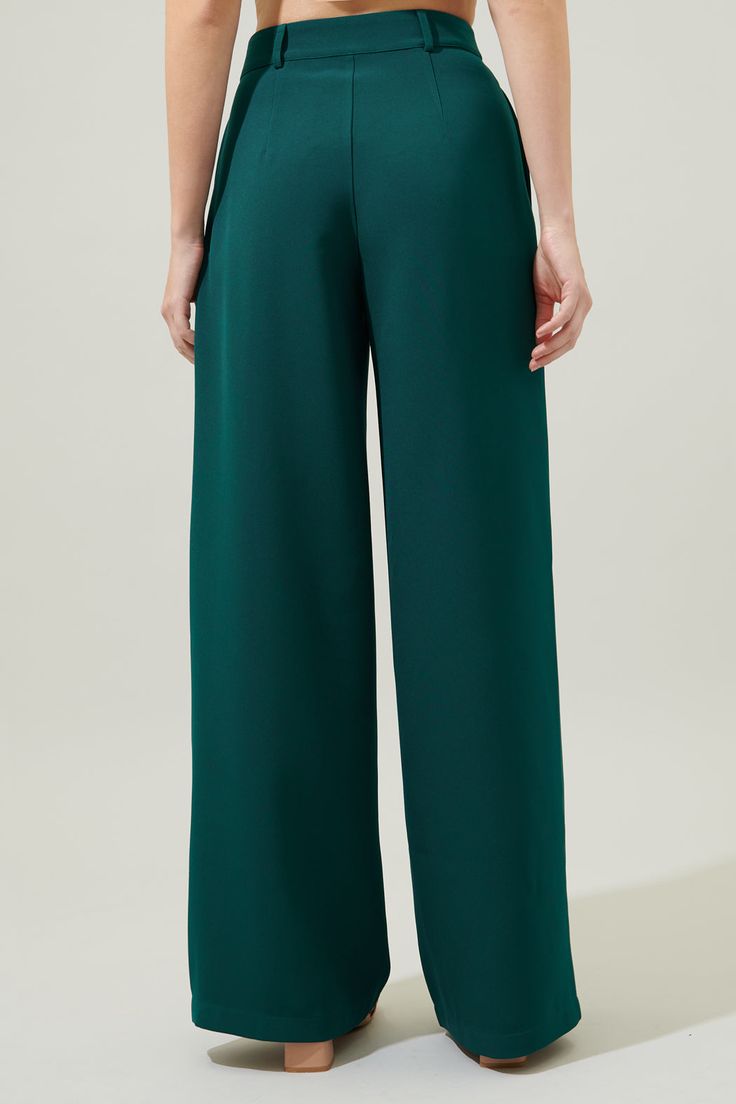 Big boss energy. You'll never want to take these trousers off. They feature a classic button closure and zipper fly, sitting high on the waist. Side pockets add character and convenience, while they maintain a wide leg fit. Pair them with the matching vest and blazer for a completed 3 piece look.- Heavy weight- High waist- Pockets- Zipper fly- Comes in 7 colorsSize + Fit - Model is 5'8" and wearing size XS- Measurements taken from size S - Waist: 14 1/4"- Inseam: 32 3/4" Fabric Self: 96% polyest Boss Energy, Maxi Coat, Big Boss, Dark Turquoise, Linen Style, Skirted Swimwear, Denim Top, Wide Leg Trousers, Swimwear Tops