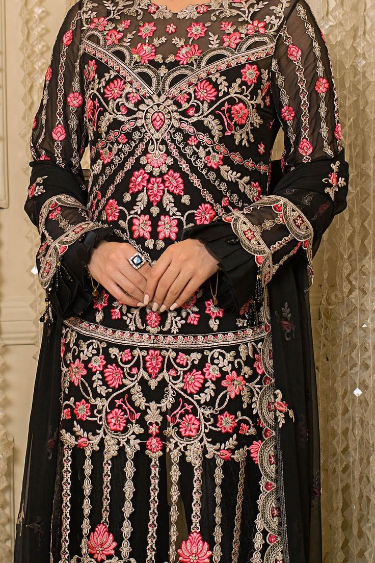 Black Chiffon suit Embroidered chiffon for front:Embroidered organza border for front:Embroidered chiffon for back:Embroidered organza border for back:Embroidered chiffon for sleeves:Embroidered organza border for sleeves:Embroidered chiffon for dupatta:Dyed raw silk for trousers INSTRUCTIONS:Actual Color may slightly vary from the image shown. Stitched Includes fabric onlyExtra laces and tassles used in our outfits are only for shoot purposes and will not be included in outfit when purchased. Sharara With Sheer Dupatta And Long Sleeves, Formal Anarkali Lawn Suit In Georgette, Formal Georgette Salwar Kameez With Dabka, Formal Georgette Lawn Suit With Sheer Dupatta, Black Dabka Wedding Suit, Formal Unstitched Sharara With Intricate Embroidery, Formal Embroidered Georgette Sharara, Party Wear Georgette Salwar Kameez With Dabka, Formal Georgette Salwar Kameez With Zari Work