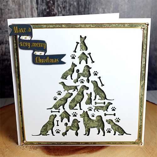 a christmas tree card with dogs on it