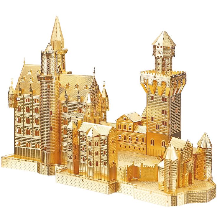 a wooden model of a castle made out of wood and gold colored paint on white background